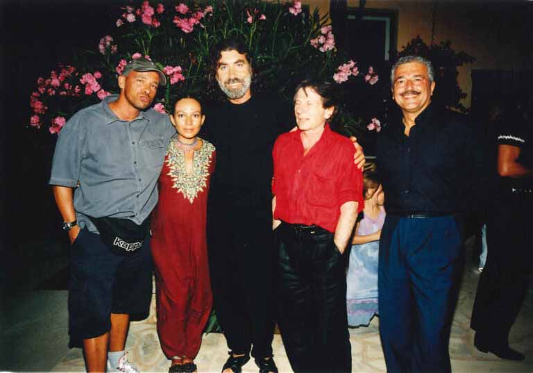 Eros Ramazzotti (izda) y Roman Polanski (camisa roja)